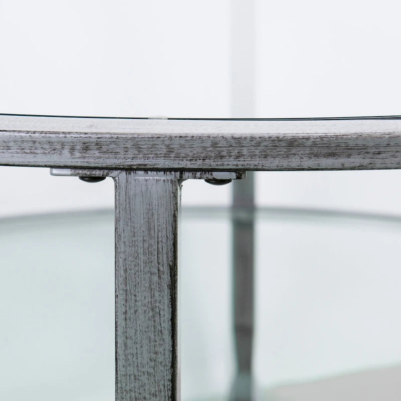 Table basse ronde en argent vieilli avec plateau en verre et étagère